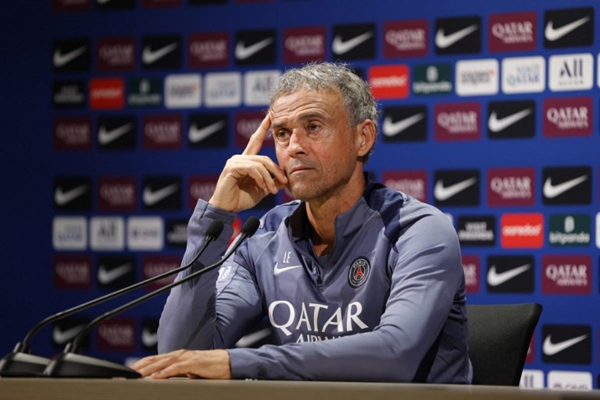 Paris Saint-Germain's Spanish headcoach Luis Enrique holds a press conference at the club's training camp in Poissy, west of Paris, on August 29, 2025. GEOFFROY VAN DER HASSELT / AFP