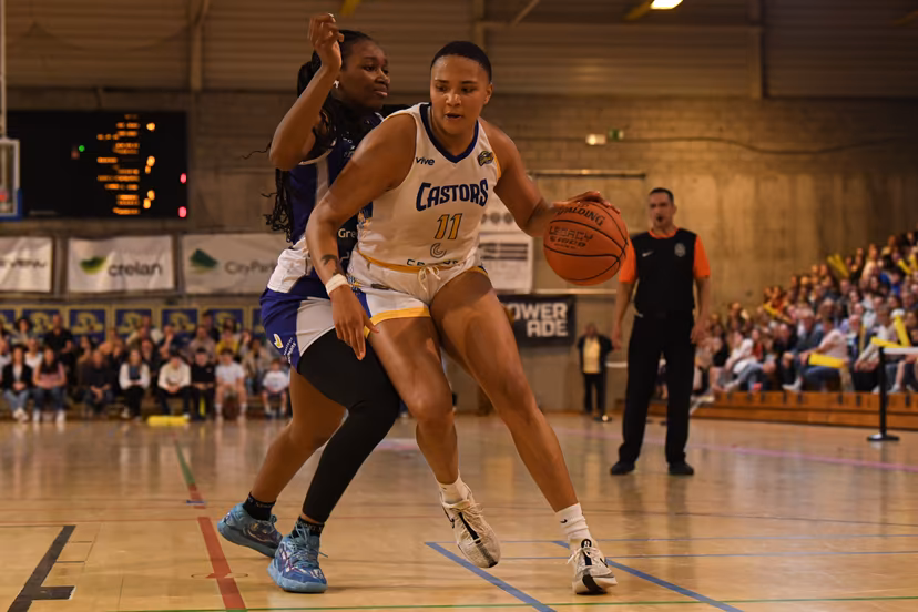 Mechelen's Annie Kibedi and Castors' Jaquaya Miller pictured in action during a basketball match between Royal Castors Braine and Kangoeroes Mechelen, Tuesday 22 April 2025, in Braine-l'Alleud, a 3rd leg best-of-3 game in the play-offs finals of the Women's Top Division Belgian basketball competition. BELGA PHOTO JILL DELSAUX