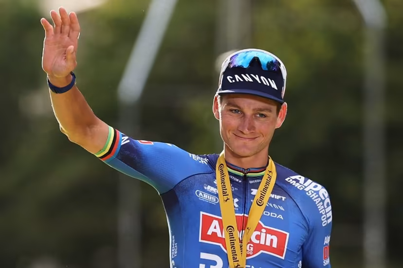 Alpecin - Premier Tech team's Dutch rider Mathieu van der Poel celebrates on the podium after winning the 21st stage of the 113th edition of the Tour de France cycling race, 88,7 km starting and finishing in Paris, on July 26, 2026. Anne-Christine POUJOULAT / AFP