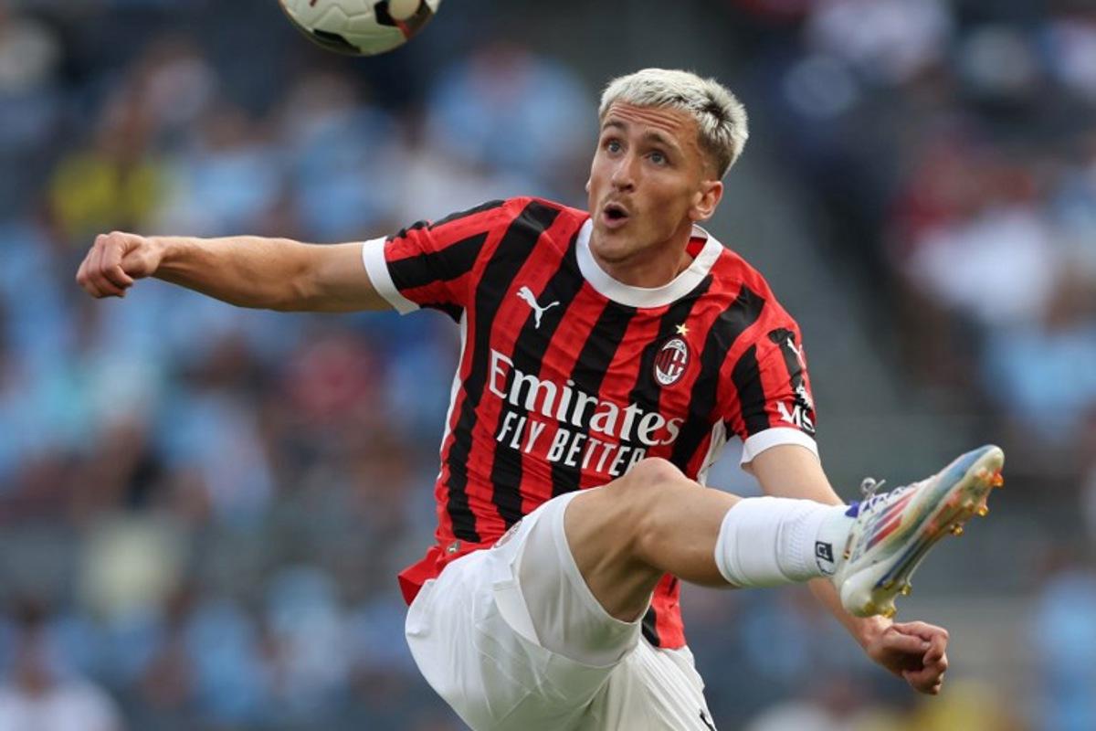 AC Milan's Belgian midfielder #56 Alexis Saelemaekers controls the ball during the pre-season club friendly football match between Manchester City and AC Milan at Yankee Stadium in New York on July 27, 2024. Charly TRIBALLEAU / AFP