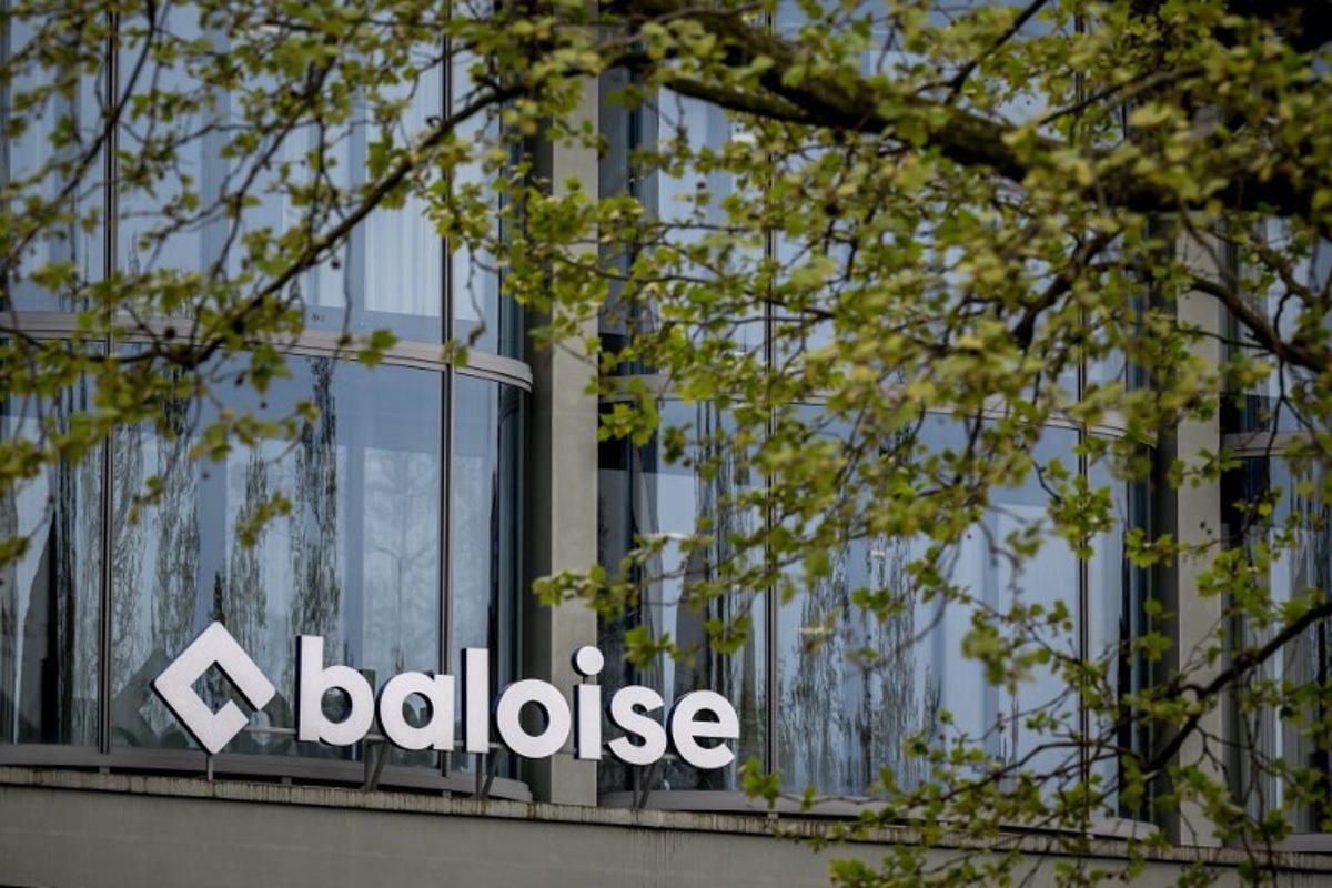 A photo shows the logo of Swiss insurance group Baloise Holding AG in Basel, on April 15, 2026. Fabrice COFFRINI / AFP