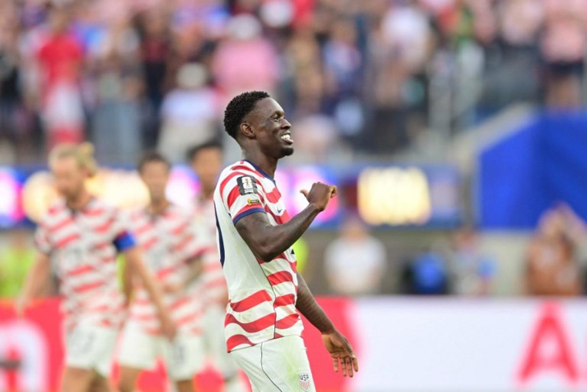 US forward #20 Folarin Balogun celebrates scoring his team's second goal during the 2026 World Cup Group D football match between USA and Paraguay at the Los Angeles Stadium in Inglewood on June 12, 2026. Frederic J. BROWN / AFP