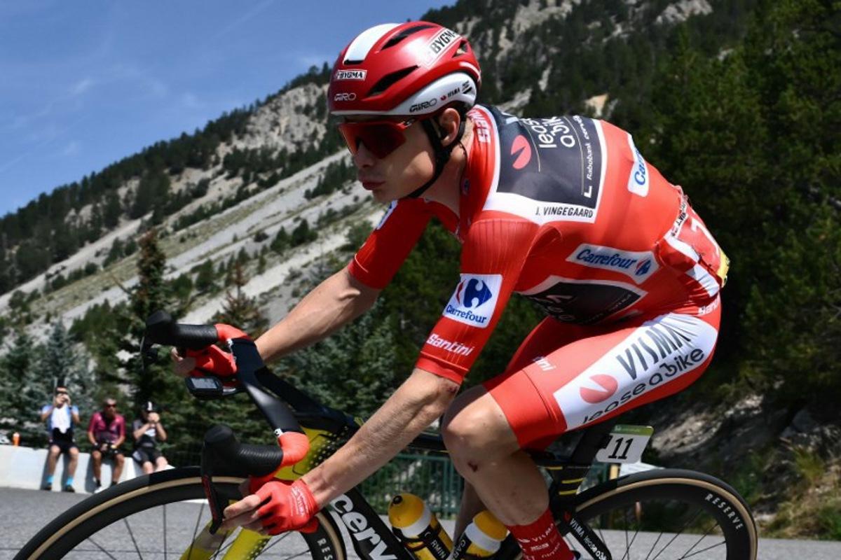 Team Visma-Lease a bike's Danish rider Jonas Vingegaard rides during the fourth stage of the Vuelta a Espana, a 192 km race between Susa and Voiron, in the Alps, on August 26, 2025. Marco BERTORELLO / AFP