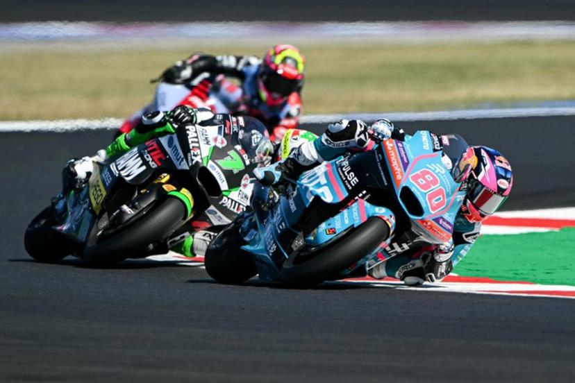 REDS Fantic Racing's Belgian rider Barry Baltus (C) and CFMOTO Aspar European Privilege Team's Colombian rider David Alonso compete during the qualifying session for the Moto2 race as part of the Misano World Circuit Marco Simoncelli, in Misano Adriatico, northern Italy on September 12, 2026. Andreas SOLARO / AFP