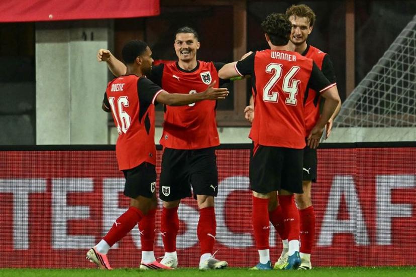 Austria's forward #09 Marcel Sabitzer (2nd L) celebrates scoring the opening goal with his teammates during the friendly football match between Austria and Tunisia in Vienna, Austria on June 1, 2026 ahead of the 2026 FIFA World Cup football tournament. Joe Klamar / AFP