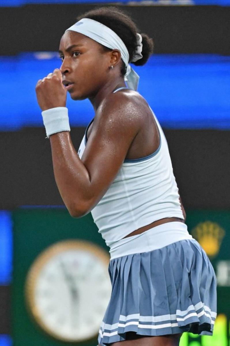 USA's Coco Gauff reacts on a point as she plays against Italy's Jasmine Paolini during their women's singles semi-final match at the Wuhan Open tennis tournament in Wuhan, Central China's Hubei province on October 11, 2025. ADEK BERRY / AFP