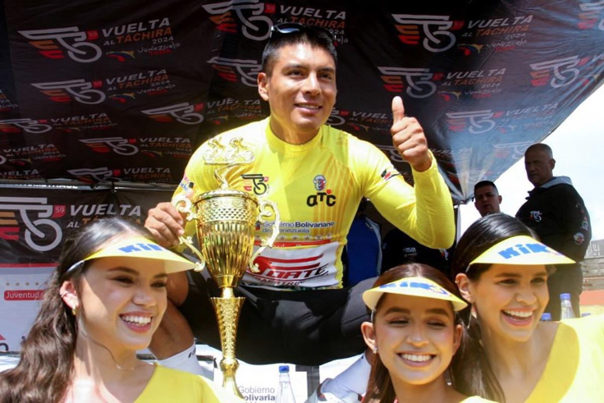 Ecuador's Jonathan Caicedo, from team Petrolike, celebrates after winning the 59th Vuelta al Tachira cycling race in San Cristobal, Tachira State, Venezuela, on January 21, 2024. Johnny PARRA / AFP