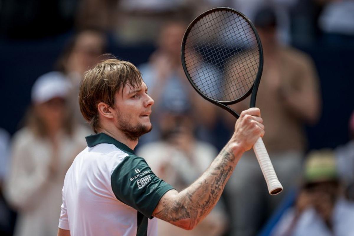 Kazakhstan's Alexander Bublik reacts after winning against Argentina's Juan Manuel Cerundolo during their Men's singles final match at the Swiss Open tennis tournament in Gstaad, on July 20, 2025. Fabrice COFFRINI / AFP
