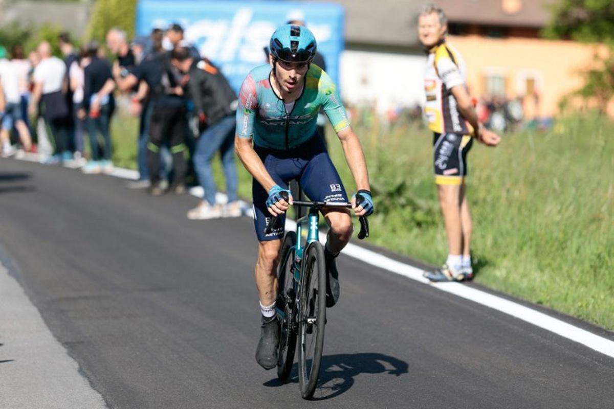 XDS Astana Team's Italian rider Christian Scaroni rides to crosses the finish line to win the 16th stage of the 108th Giro d'Italia cycling race of 203kms from Piazzola sul Brenta to San Valentino on May 27, 2025. Luca Bettini / AFP