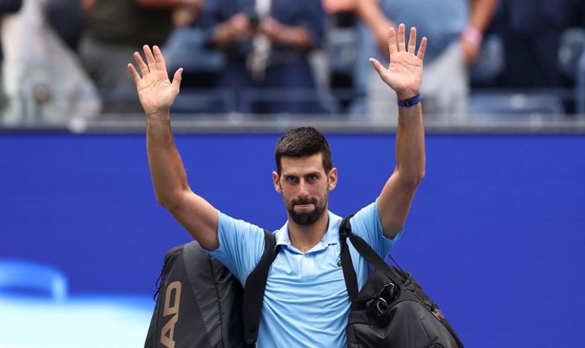 Serbia's Novak Djokovic waves as he leaves the court after losing the men's singles semifinal tennis match against Spain's Carlos Alcaraz on day thirteen of the US Open tennis tournament at the USTA Billie Jean King National Tennis Center in New York City, on September 5, 2025. CHARLY TRIBALLEAU / AFP