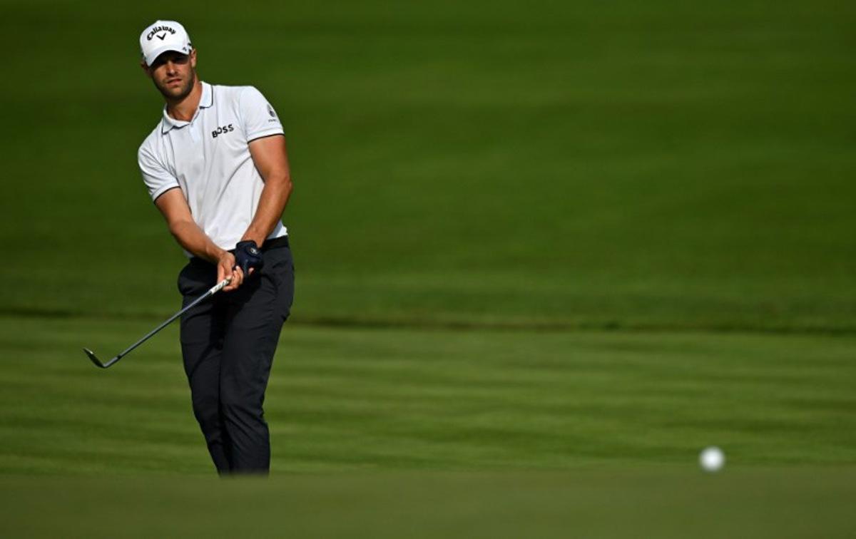 Belgium's Thomas Detry chips onto the 12th green on day three of the BMW PGA Championship at Wentworth Golf Club, south-west of London, on September 16, 2023. Glyn KIRK / AFP