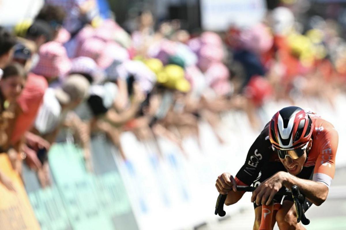 INEOS Grenadiers team's French rider Axel Laurance reacts as he crossed the finish line during the 7th stage of the 112th edition of the Tour de France cycling race, 197 km between Saint-Malo and Mur-de-Bretagne Guerledan, in Brittany, western France, on July 11, 2025. Loic VENANCE / AFP