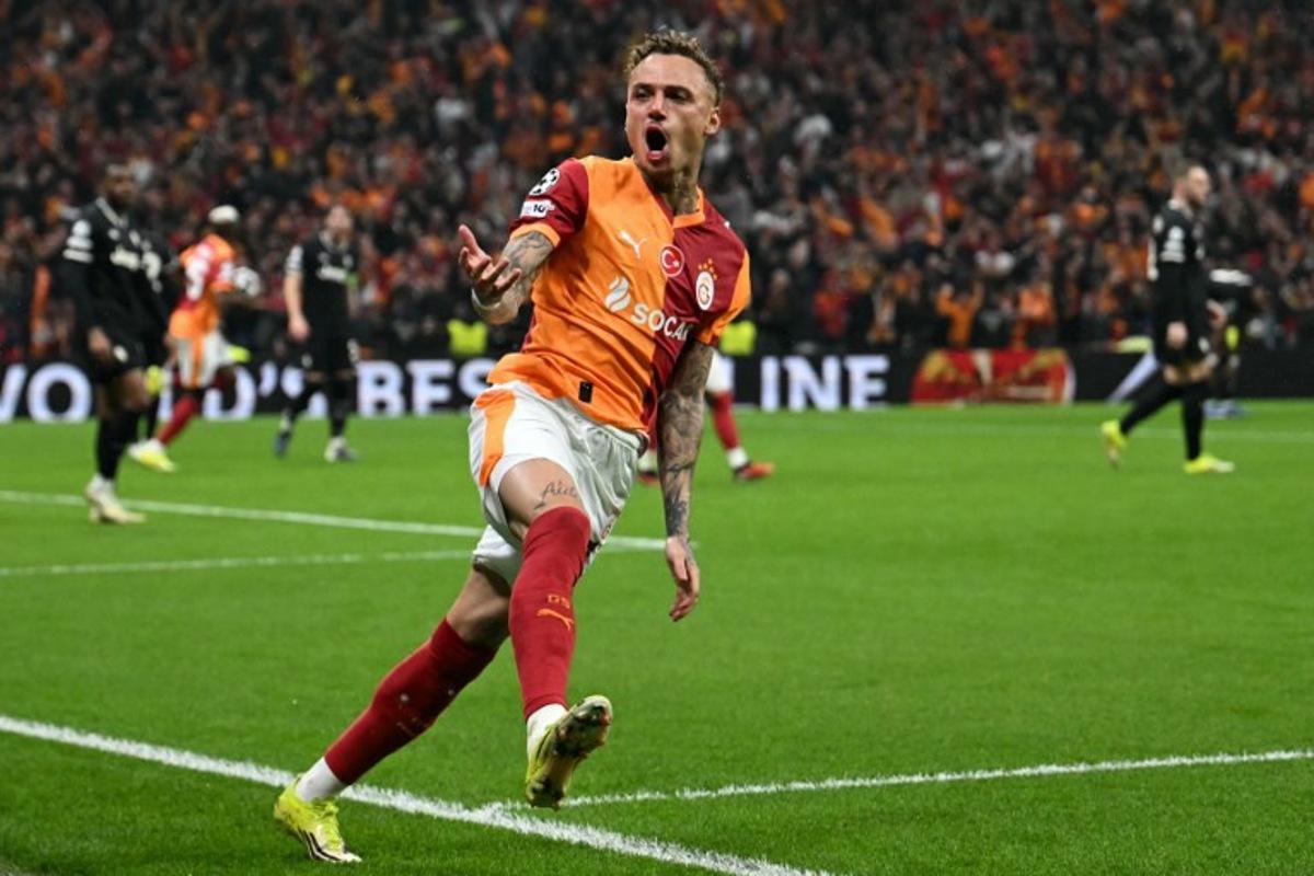 Galatasaray's Dutch forward #77 Noa Lang celebrates scoring his team's second goal during the UEFA Champions League, knockout round play-off 1st leg, football match between Galatasaray SK and Juventus FC at the Rams Park in Istanbul on February 17, 2026. OZAN KOSE / AFP