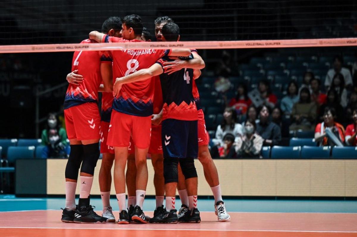 Tunisia players huddle during the match between Turkey and Tunisia on the final day of the Volleyball World Cup 2023 men's Olympic qualifying tournament at Yoyogi National Stadium in Tokyo on October 8, 2023. Richard A. Brooks / AFP