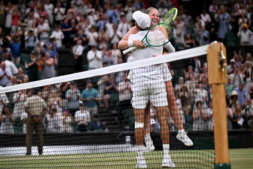 El Salvador's Marcelo Arevalo and Latvia's Jelena Ostapenko celebrate winning against Australia's players Marc Polmans and Storm Hunter during their mixed's doubles final tennis match on the eleventh day of the 2026 Wimbledon Championships at The All England Lawn Tennis and Croquet Club in Wimbledon, southwest London, on July 9, 2025. Kirill KUDRYAVTSEV / AFP