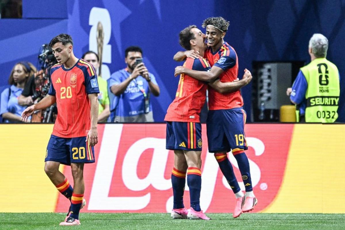 Spain's forward #19 Lamine Yamal (R) celebrates with teammates after scoring the opening goal during the 2026 World Cup Group H football match between Spain and Saudi Arabia at the Atlanta Stadium in Atlanta on June 21, 2026. ROBERTO SCHMIDT / AFP