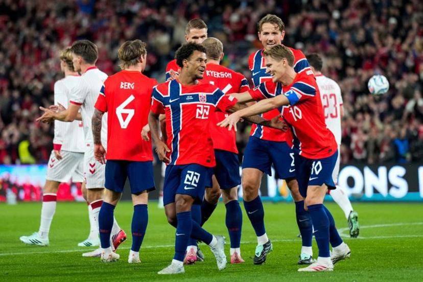 Norway's midfielder #22 Oscar Bobb (C) celebrates scoring his team's first goal with teammates during the UEFA Nations League Group A4 football match between Norway and Denmark in Oslo on September 24, 2026. Fredrik Varfjell / NTB / AFP
