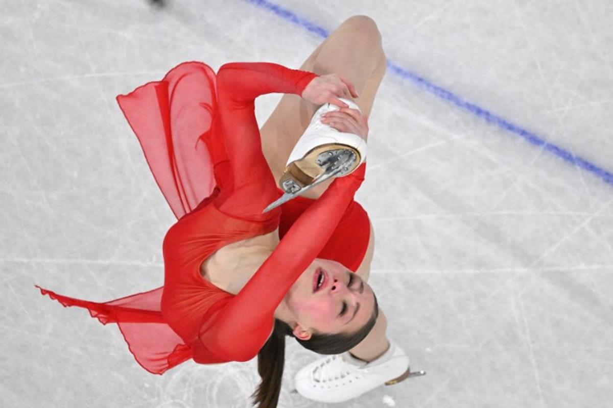 Belgium's Nina Pinzarrone competes in the figure skating women's single free skating final during the Milano Cortina 2026 Winter Olympic Games at Milano Ice Skating Arena in Milan on February 19, 2026. Antonin THUILLIER / AFP