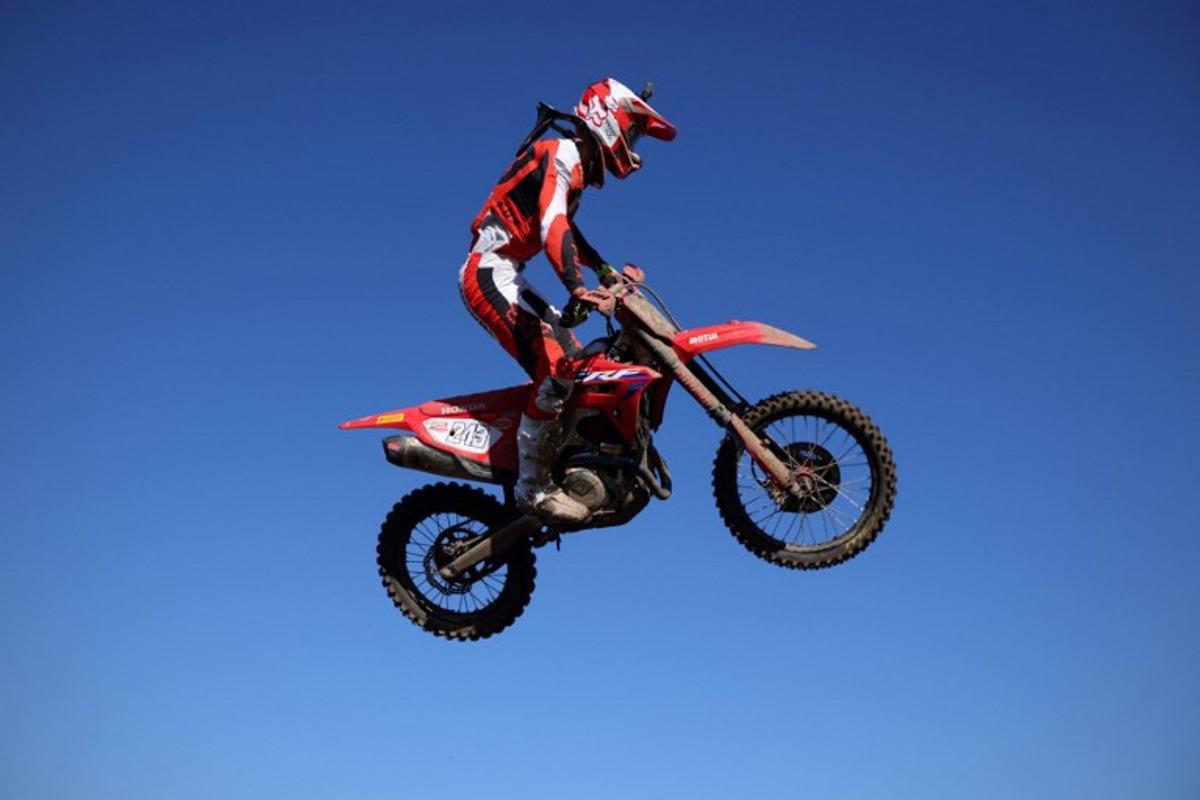 Slovenia's Tim Gajser on his way to victory in the first race of the MX GP class during the motorcross MXGP of Great Britain at Matterley Basin in Winchester, southern England on February 27, 2022. ADRIAN DENNIS / AFP