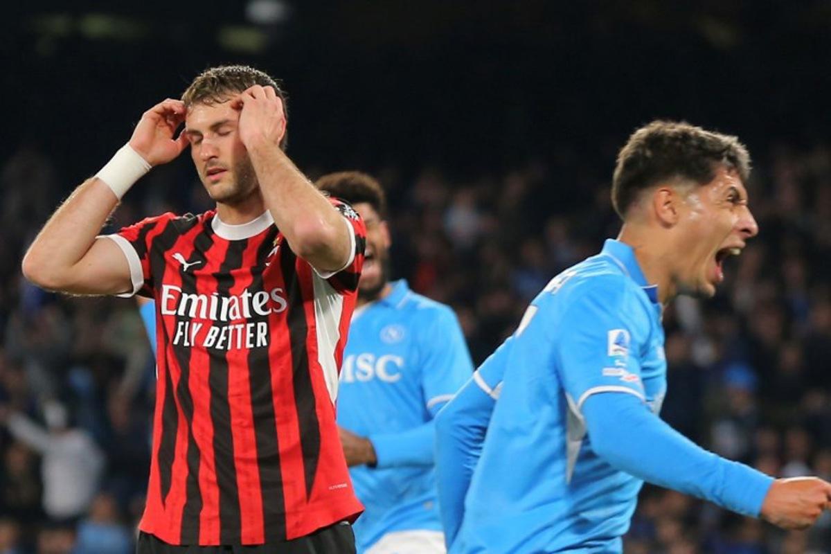 AC Milan's Mexican forward #07 Santiago Gimenez reacts after missing a penalty shot during the Italian Serie A football match between Napoli and AC Milan at the Stadio Diego Armando Maradona in Naples, on March 30, 2025. CARLO HERMANN / AFP