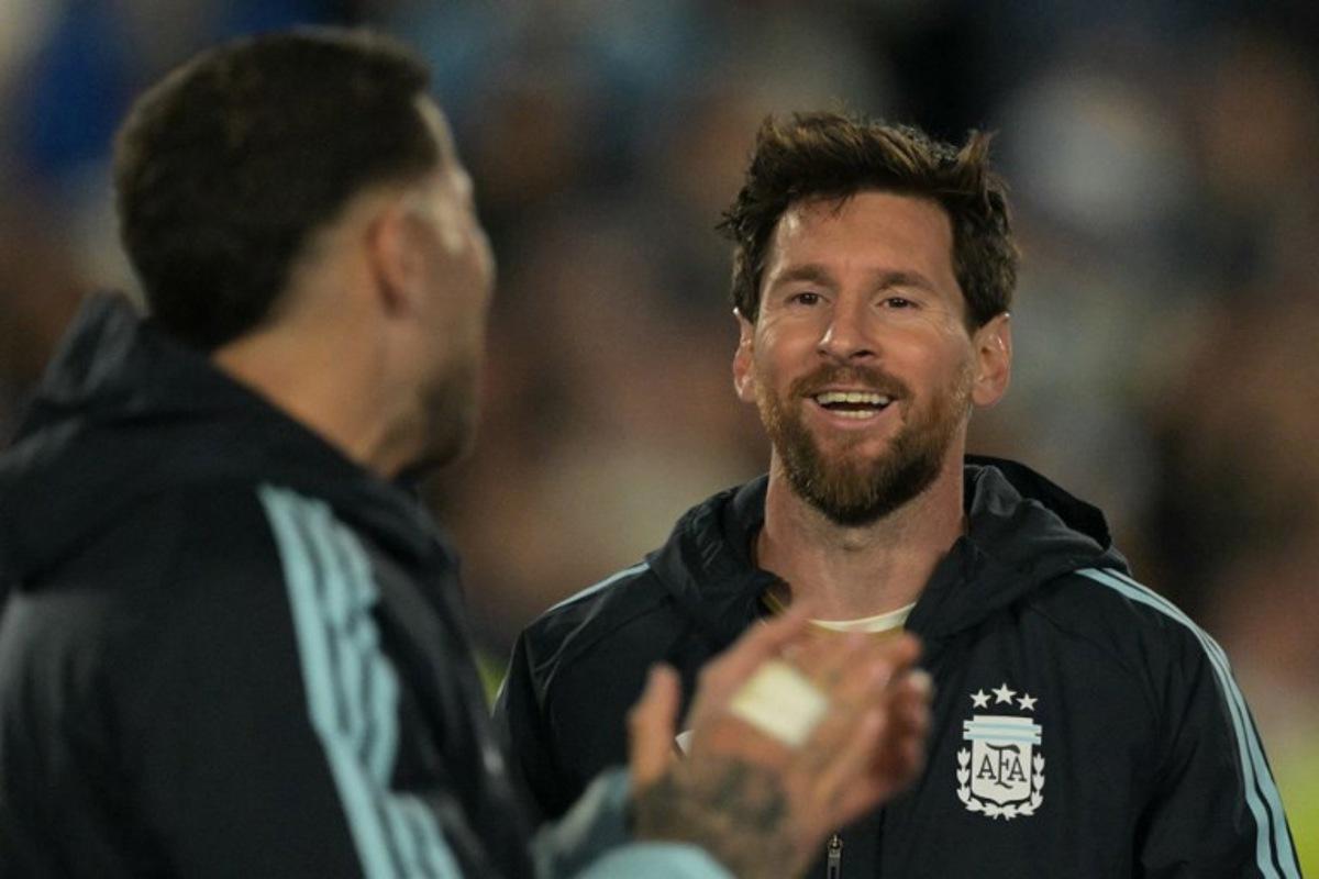 Argentina's forward #10 Lionel Messi shares a light moment with his teammates following the international friendly football match between Argentina and Benin at the Mas Monumental stadium in Buenos Aires on October 6, 2026. JUAN MABROMATA / AFP