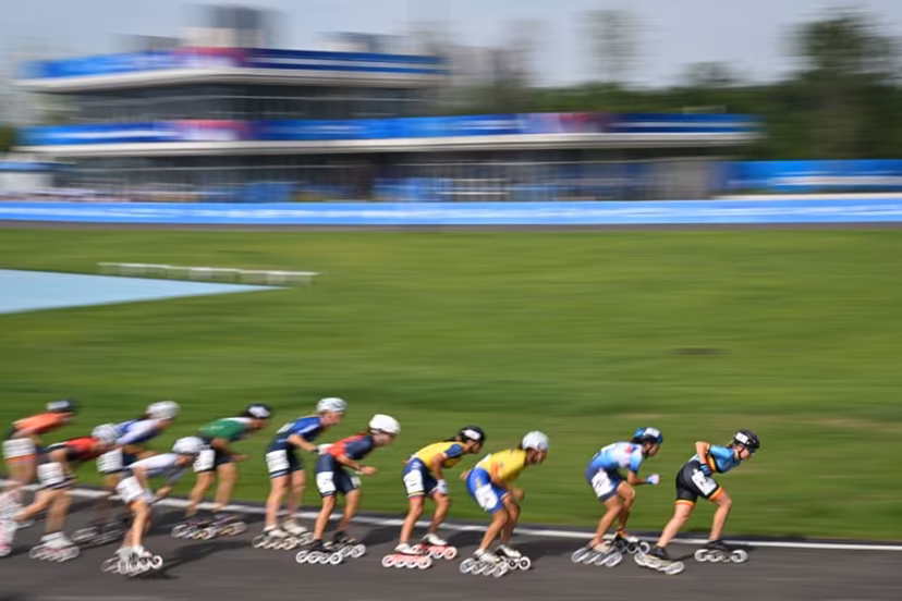 Belgium's Jorun Geerts (1st-R) competes in the women's 100m speed skating road sprint semifinal during the 2025 World Games at the Shuyue Park in Chengdu, in China's southwestern Sichuan province on August 13, 2025. JADE GAO / AFP