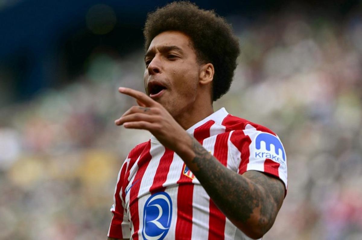 Atletico Madrid's Belgian midfielder #20 Axel Witsel celebrates scoring his team's second goal during the FIFA Club World Cup 2025 Group B football match between US Seattle Sounders and Spain's Atletico de Madrid at the Lumen Field stadium in Seattle on June 19, 2025. Pablo PORCIUNCULA / AFP