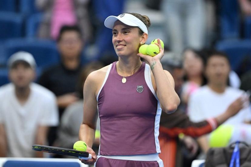 Belgium's Elise Mertens celebrates after winning her women's singles match against USA's Coco Gauff at the China Open tennis tournament in Beijing on October 7, 2026. Adek BERRY / AFP