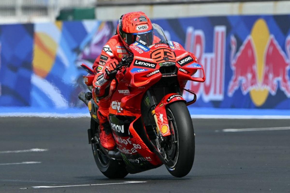 Ducati Lenovo Team's Spanish MotoGP rider Marc Marquez accelerates down the straight as he leads the San Marino Moto GP Grand Prix at the Misano World Circuit Marco Simoncelli, in Misano Adriatico, northern Italy, on September 14, 2025. Andreas SOLARO / AFP