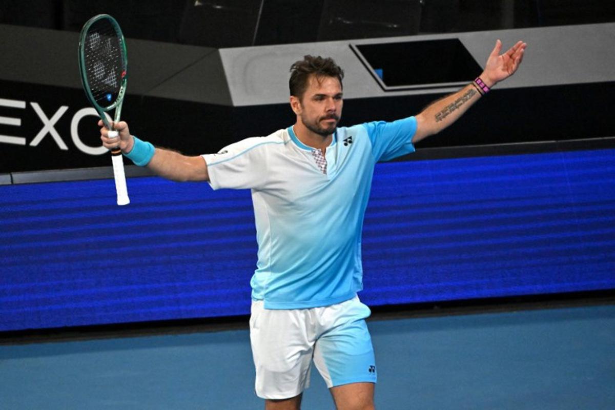 Switzerland's Stan Wawrinka reacts after a point against USA's Taylor Fritz during their men's singles match on day seven of the Australian Open tennis tournament in Melbourne on January 24, 2026. Paul Crock / AFP