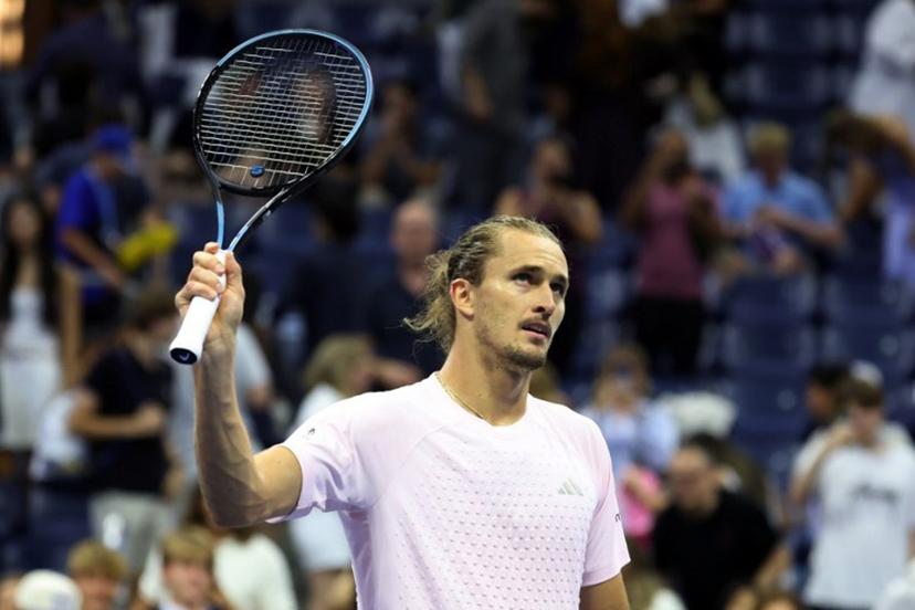 Germany's Alexander Zverev waves his racquet to the crowd after defeating Chile's Alejandro Tabilo during their men's singles third-round tennis match on day seven of the US Open tennis tournament at the USTA Billie Jean King National Tennis Center in New York City in the early hours of September 6, 2026. Leonardo MUNOZ / AFP