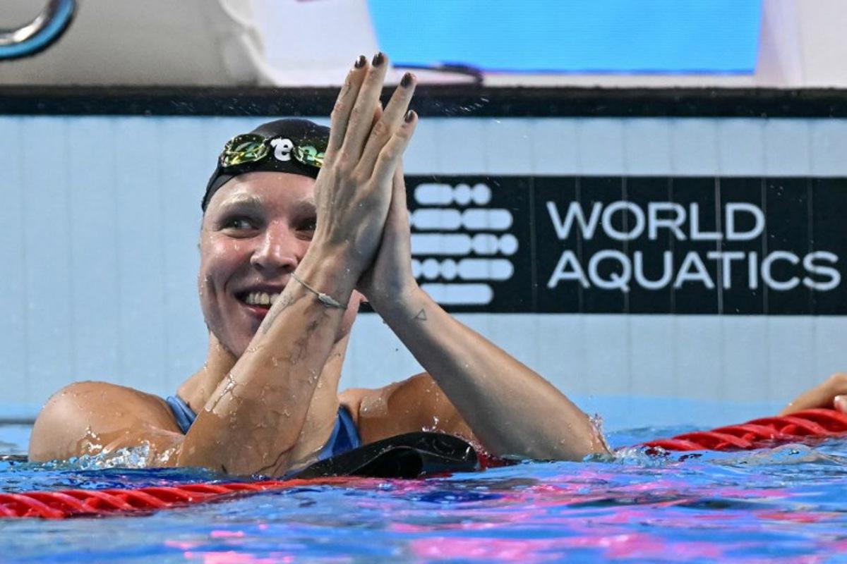 Lithuania's swimmer Ruta Meilutyte celebrates after winning the women's 50m breaststroke swimming event during the 2025 World Aquatics Championships in Singapore on August 3, 2025. Manan VATSYAYANA / AFP
