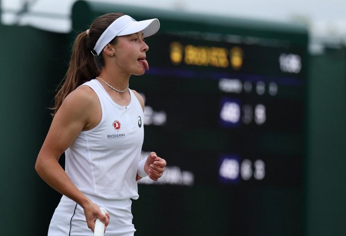 Turkey's Zeynep Sonmez reacts after missing a shot as she plays against Russia's Ekaterina Alexandrova during their women's singles third round tennis match on the sixth day of the 2025 Wimbledon Championships at The All England Lawn Tennis and Croquet Club in Wimbledon, southwest London, on July 5, 2025. Adrian Dennis / AFP