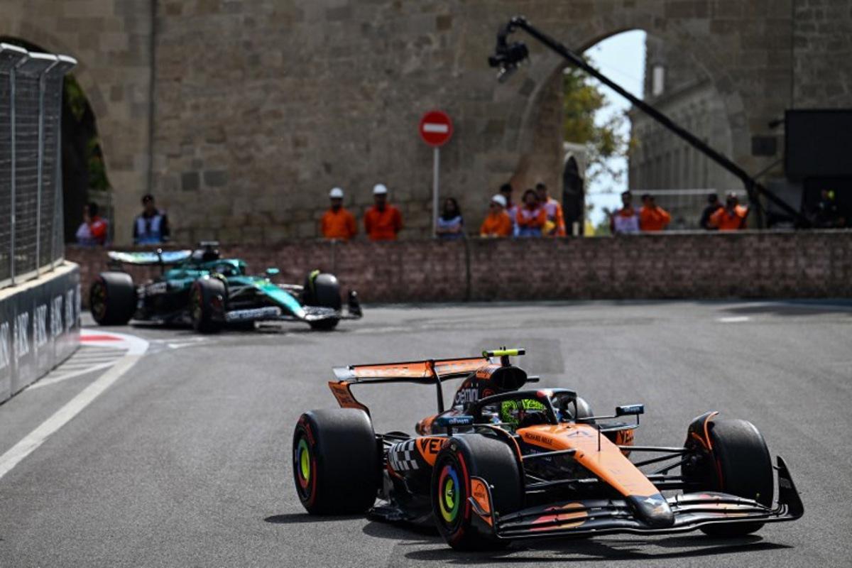 McLaren's British driver Lando Norris (R) and McLaren's British driver Lando Norris drive during a practice session of the Formula One Azerbaijan Grand Prix at the Baku City Circuit in Baku on September 19, 2025. Ozan KOSE / AFP