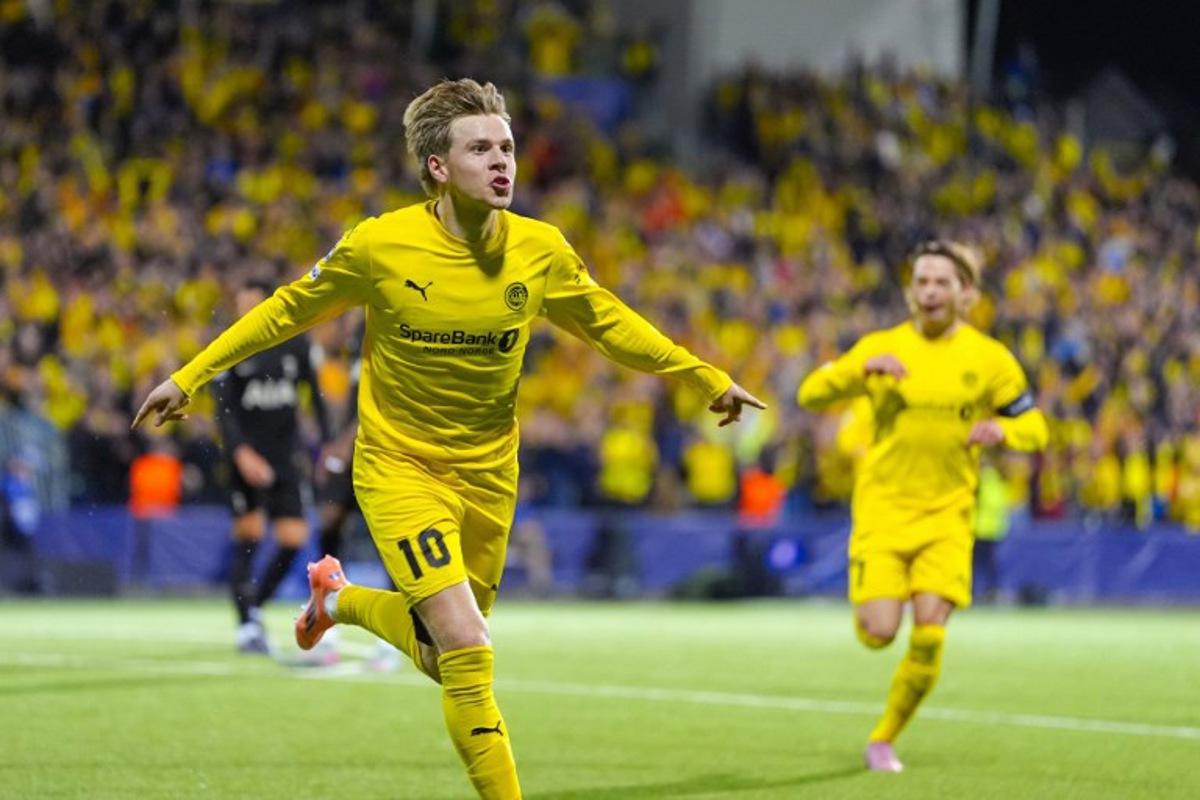 Bodoe/Glimt's Norwegian forward #23 Jens Petter Hauge celebrates scoring during the UEFA Champions League, League Phase - Matchday 2 football match between Bodoe/Glimt and Tottenham Hotspur in Bodoe, Norway on September 30, 2025. Lise Åserud / NTB / AFP