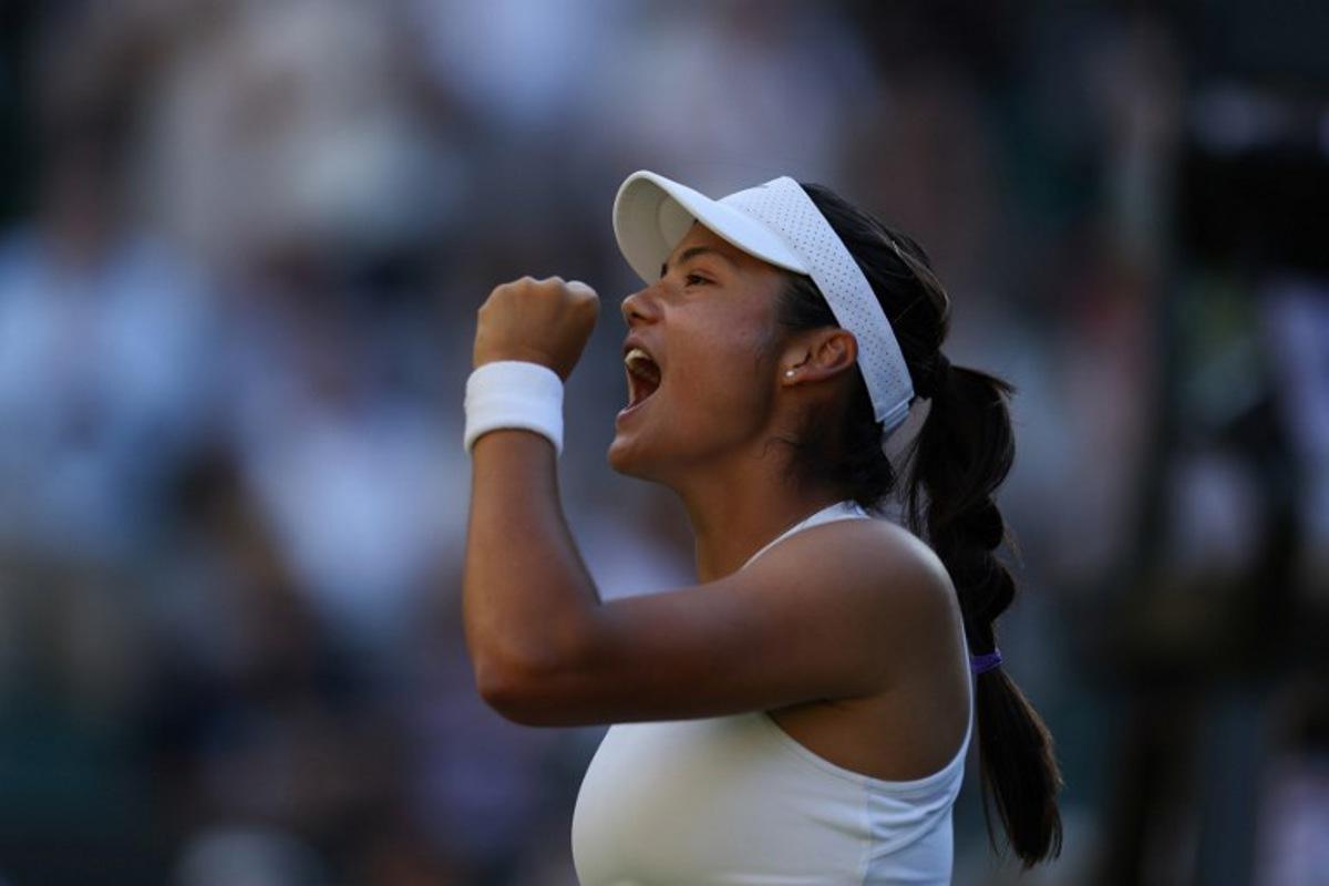 Britain's Emma Raducanu celebrates after winning against Britain's Mingge Xu the women's singles first round tennis match on the first day of the 2025 Wimbledon Championships at The All England Lawn Tennis and Croquet Club in Wimbledon, southwest London, on June 30, 2025. Adrian Dennis / AFP