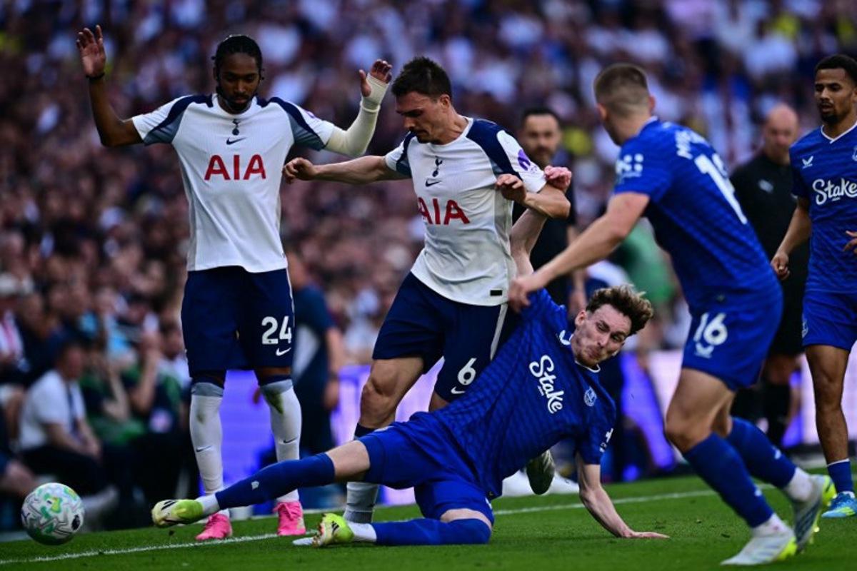 Everton's English midfielder #37 James Garner (2R) vies with Tottenham Hotspur's Portugese midfielder #06 Joao Palhinha (2L) during the English Premier League football match between Tottenham Hotspur and Everton at the Tottenham Hotspur Stadium in London, on May 24, 2026. Ben STANSALL / AFP