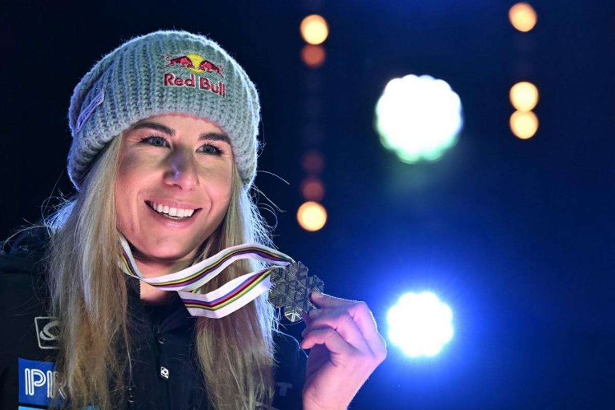 Third-placed Czech Republic's Ester Ledecka poses for pictures during the medal ceremony after the Women's Downhill event of the Saalbach 2025 FIS Alpine World Ski Championships in Hinterglemm on February 8, 2025. Fabrice COFFRINI / AFP
