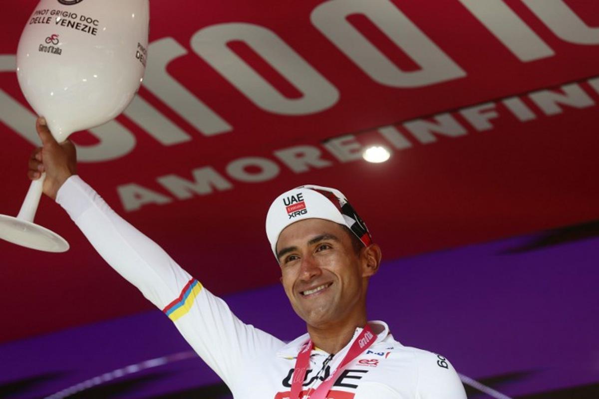 UAE Team Emirates - XRG Ecuadorian rider Jhonatan Narvaez celebrates on the podium after winning the 8th stage of the Giro d'Italia 2026 - Tour of Italy cycling race between Chieti and Fermo, central Italy on May 16, 2026. Luca Bettini / AFP