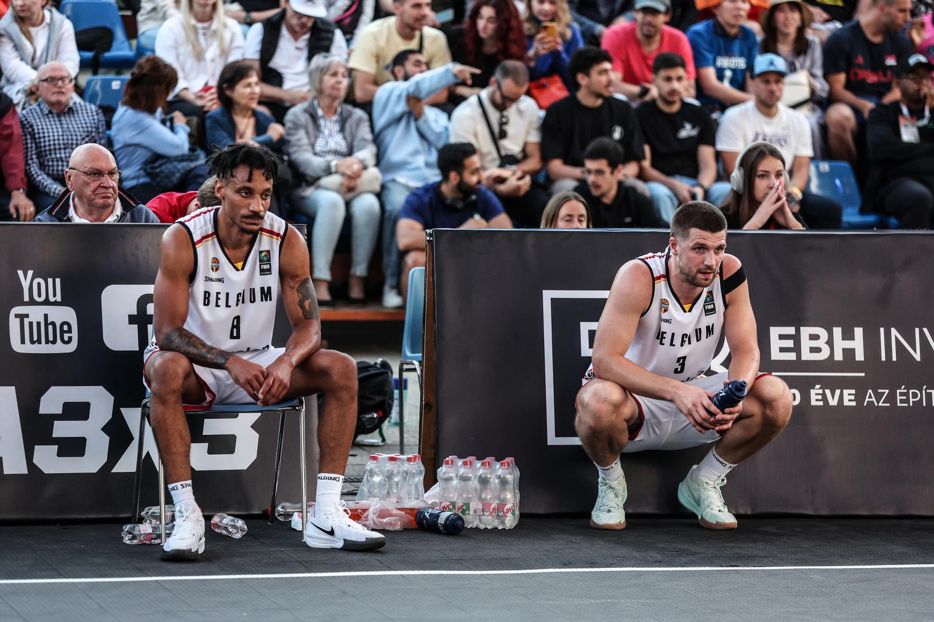 Belgian Dennis Donkor and Belgian Bryan De Valck look dejected after a third game in the group stage between Belgium and Poland in the group D at the Olympic qualification tournament for the 2024 Olympics, in Debrecen, Hungary, Saturday 18 May 2024. BELGA PHOTO NIKOLA KRSTIC