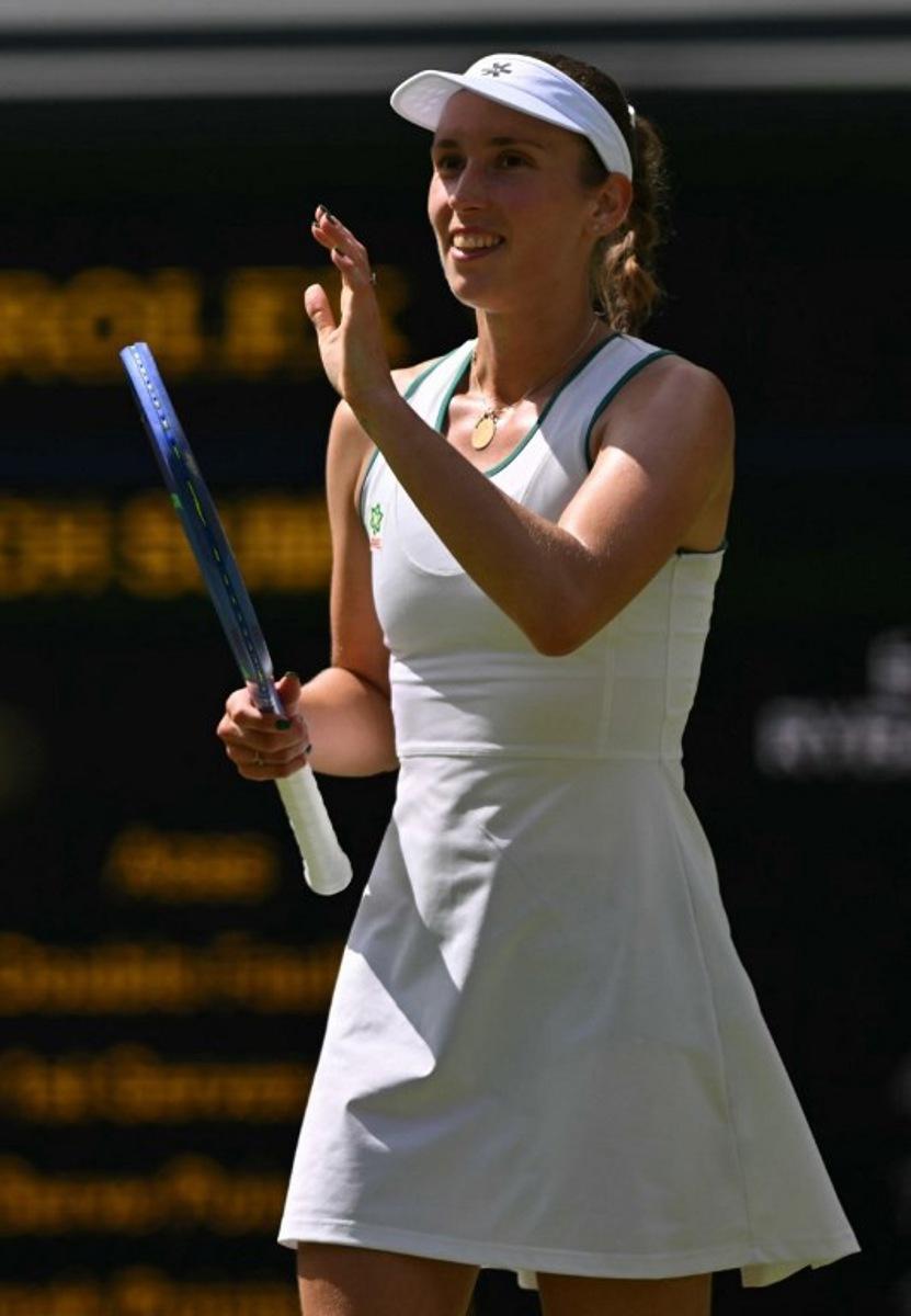 Belgium's Elise Mertens celebrates winning against Kazakhstan's Elena Rybakina during their women's singles third round tennis match on the sixth day of the 2026 Wimbledon Championships at The All England Lawn Tennis and Croquet Club in Wimbledon, southwest London, on July 4, 2026. Glyn KIRK / AFP