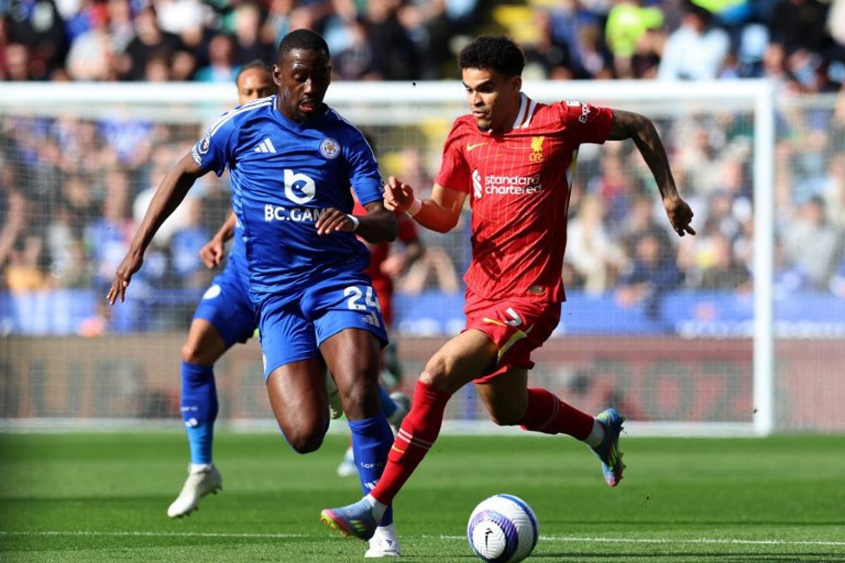 Leicester City's French midfielder #24 Boubakary Soumare (L) vies with Liverpool's Colombian midfielder #07 Luis Diaz (R) during the English Premier League football match between Leicester City and Liverpool at King Power Stadium in Leicester, central England on April 20, 2025. Darren Staples / AFP