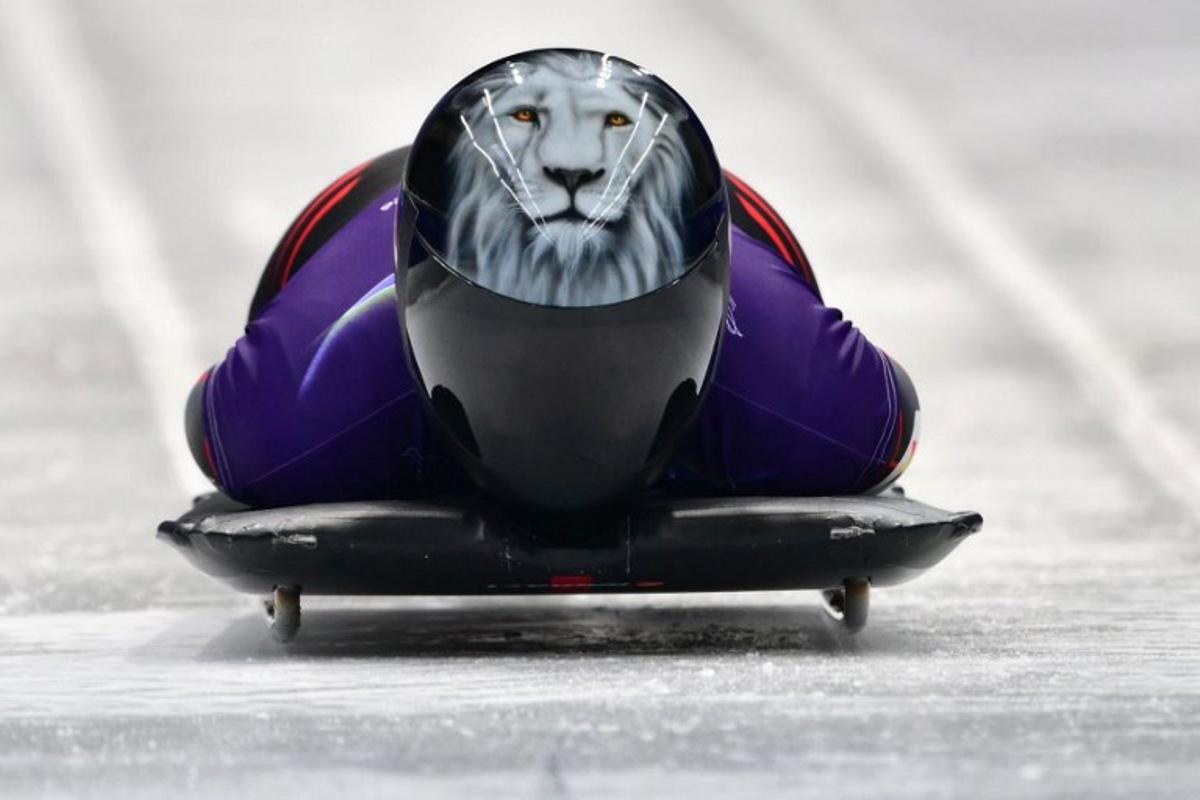 Belgium's Kim Meylemans takes part in the skeleton women's training session at Cortina Sliding Centre during the Milano Cortina 2026 Winter Olympic Games in Cortina d'Ampezzo on February 11, 2026. Stefano RELLANDINI / AFP