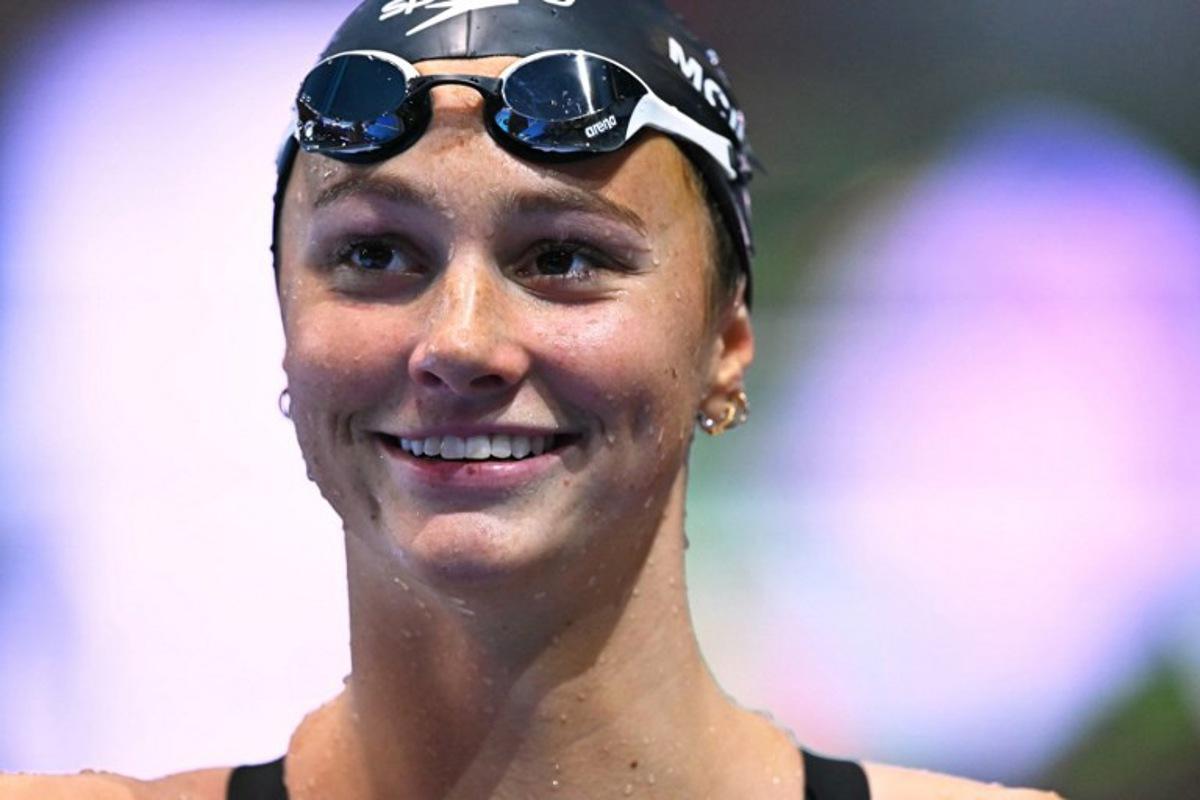 Canada's swimmer Summer McIntosh reacts after a heat of the women's 400m individual medley swimming event during the 2025 World Aquatics Championships in Singapore on August 3, 2025. MANAN VATSYAYANA / AFP