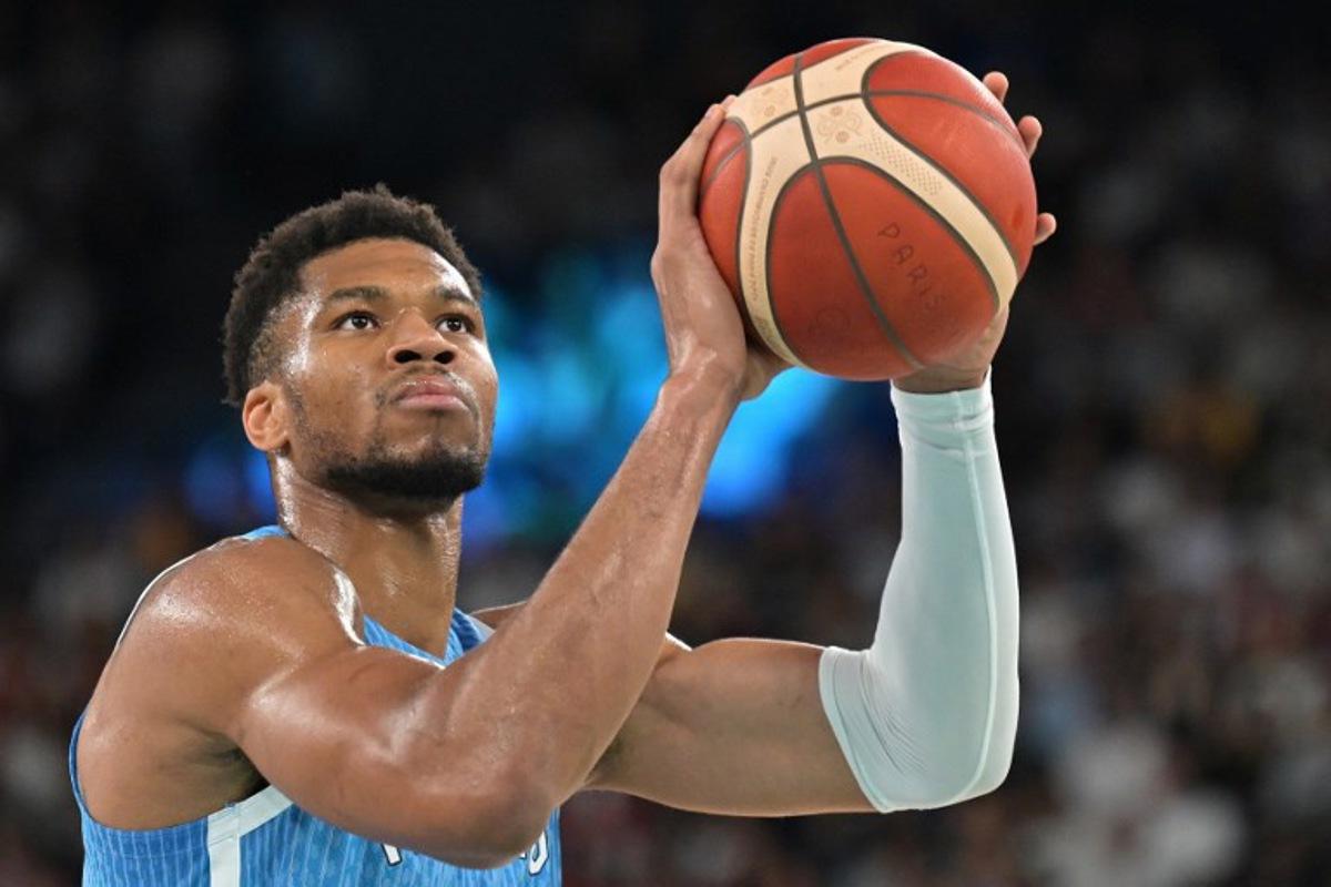 Greece's #34 Giannis Antetokounmpo takes a free throw in the men's quarterfinal basketball match between Germany and Greece during the Paris 2024 Olympic Games at the Bercy Arena in Paris on August 6, 2024. Damien MEYER / AFP