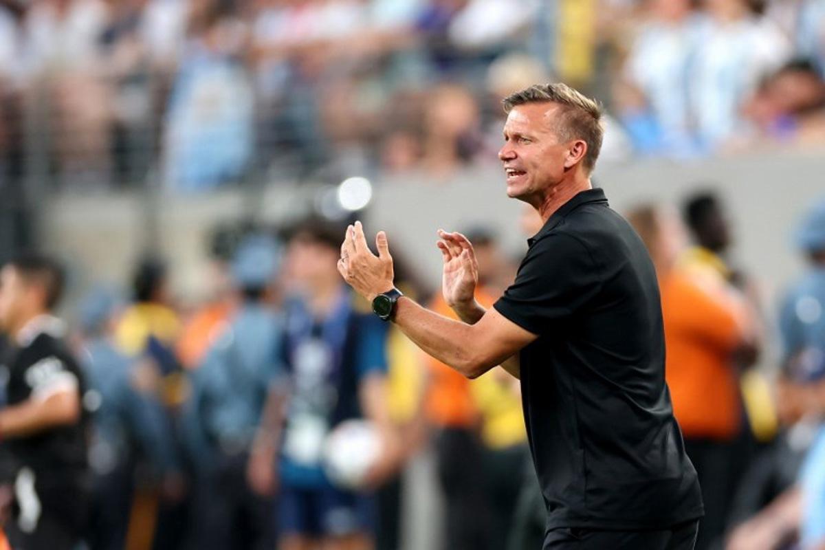 Canada's US coach Jesse Marsch shouts instructions to his players from the touchline during the Conmebol 2024 Copa America tournament semi-final football match between Argentina and Canada at MetLife Stadium, in East Rutherford, New Jersey on July 9, 2024. CHARLY TRIBALLEAU / AFP