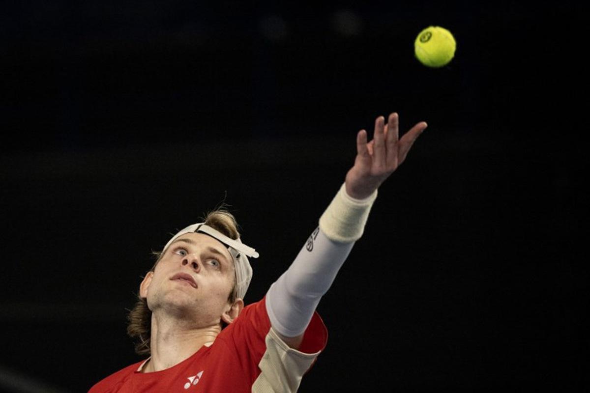 Belgian Zizou Bergs serves the ball to France's Ugo Humbert during their semi-final simple tennis match at the Marseille Open 13 ATP World Tour in Marseille, southern France on February 15, 2025. MIGUEL MEDINA / AFP