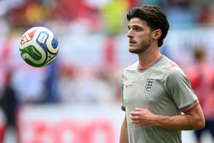 England's midfielder #04 Declan Rice warms up ahead of the 2026 World Cup football tournament quarter-final match between Norway and England at Miami Stadium in Miami Gardens on July 11, 2026. MAURO PIMENTEL / AFP