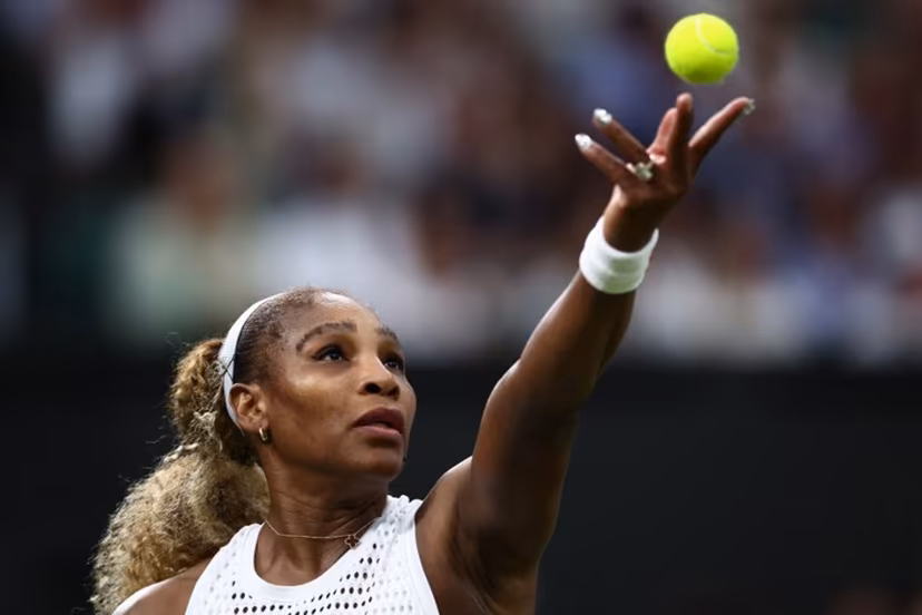 US player Serena Williams serves the ball to Australia's Maya Joint during their women's singles first round tennis match on the second day of the 2026 Wimbledon Championships at The All England Lawn Tennis and Croquet Club in Wimbledon, southwest London, on June 30, 2026. HENRY NICHOLLS / AFP