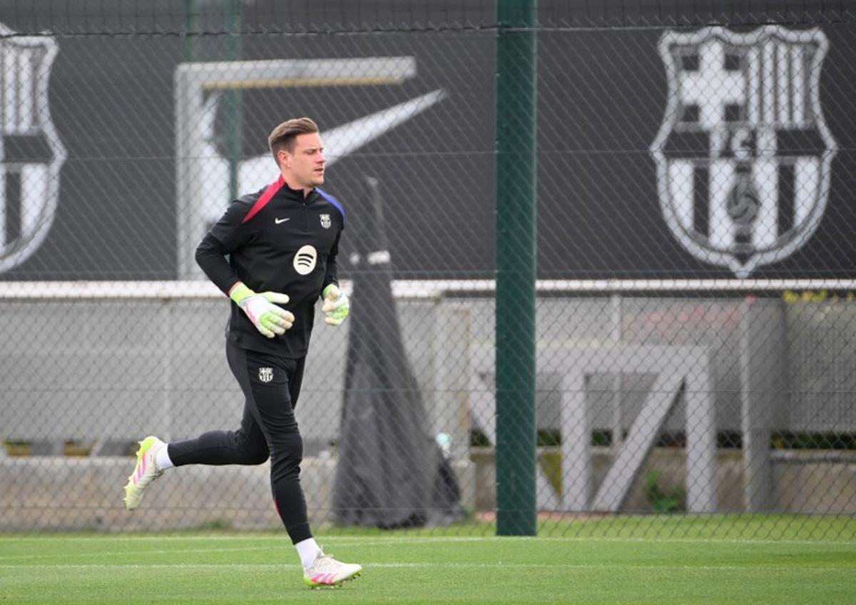 Barcelona's German goalkeeper #01 Marc-Andre Ter Stegen takes part in a training session on the eve of the Spanish league football match between FC Barcelona and Real Madrid CF, at the Joan Gamper training ground in Sant Joan Despi, near Barcelona, on May 10, 2025. Josep LAGO / AFP